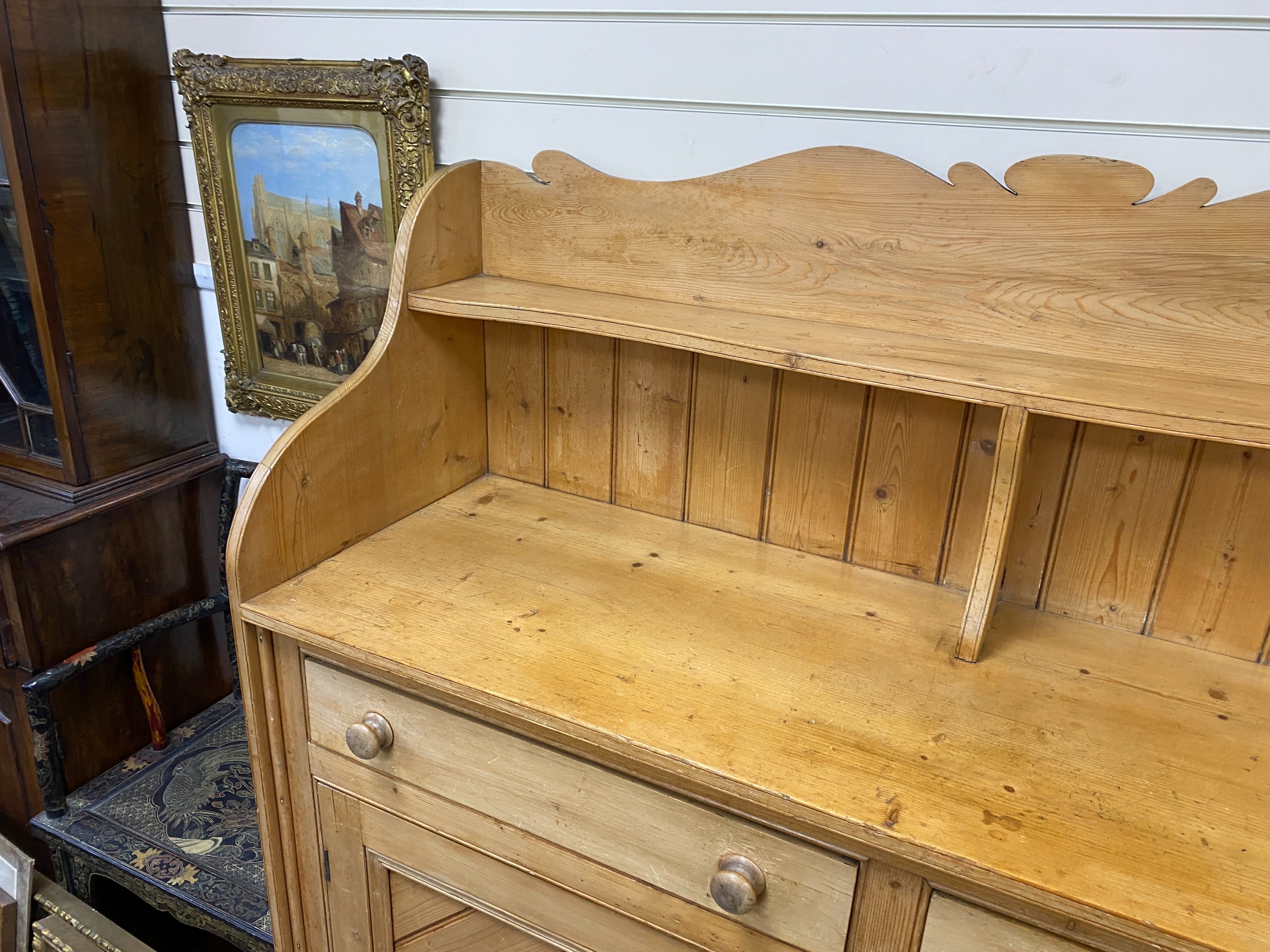 A Victorian pine two drawer buffet, width 152cm depth 48cm height 158cm